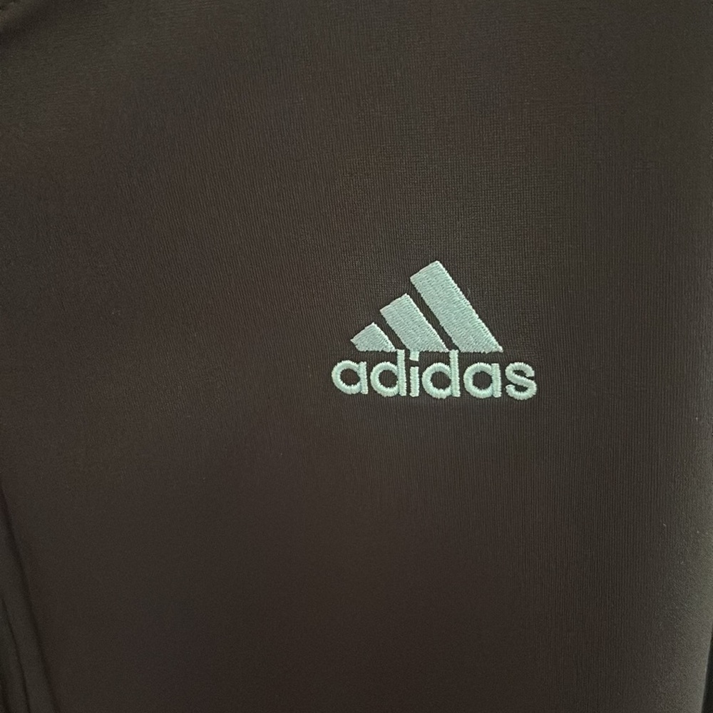 Black hoodie with gold,blue and green stripes on sleeve - Picture 6 of 7